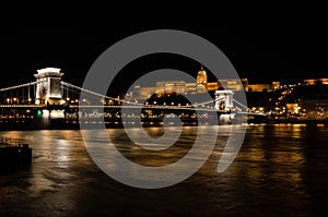 The famous Chain bridge with the castle in the background at night, Budapest, Hungary