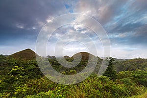 The famous Chocolate Hills at sunrise with beautiful coloured sky, Carmen, Bohol island, Philippines