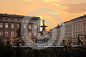 Famous christkindlmarkt salzburg with illuminated christmas tree photo