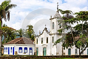 Famous churche between th vegetation in the ancient and historic city of Paraty photo