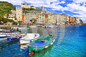 Traditional colorful houses ,boats and turquoise sea,Portovenere village,Cinque Terre,Liguria,Italy.