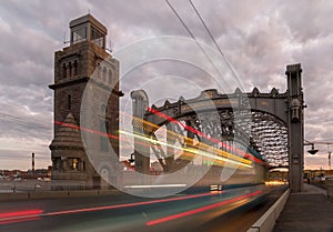 Famous city river steel crossover entitled as The Peter the Great bridge in Saint - Petersburg