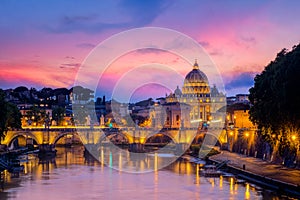 Famous cityscape view of St Peters basilica in Rome at sunset