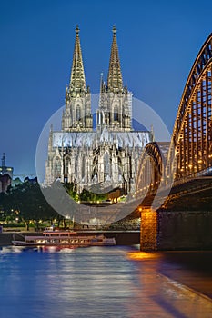 The famous Cologne Cathedral and the Hohenzollern railway bridge