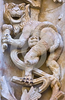 Famous creature with ice cream carved in stone; plateresque style sculpture of the New Cathedral of Salamanca, Spain.