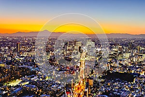 Famous Destinations. Night View of Picturesque Tokyo Skyline at Golden Hour With Fuji Mountain in Background