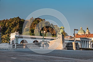 Famous dragon bridge or zmajski most, a landmark in ljublana, slovenia in early morning hours. Nobody around. Detail of dragon and