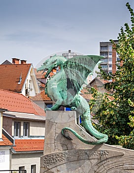Famous Dragon statue on Zmajski most or Zmajev most (Dragon bridge)  in Ljubljana photo