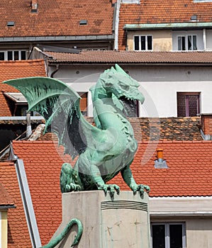 Famous Dragon statue on Zmajski most or Zmajev most Dragon bridge  in Ljubljana photo