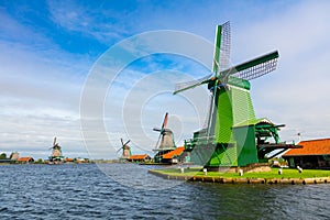 Famous Dutch village with windmills, Agricultural historical landscape. Tourism. Popular Holland, Netherlands, Europe
