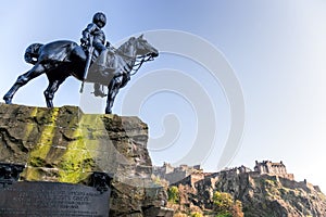 Edinburgh, Scotland, 5th May 2016 The Royal Scots Greys Monument statue against Edinburgh Castle in West Princes Street Gardens