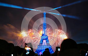 Famous Eiffel Tower and beautiful fireworks during celebrations of French national holiday - Bastille Day.