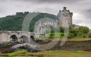 The famous Eilean Donan Castle in the lake of Loch Alsh  at the Highlands of Scotland photo