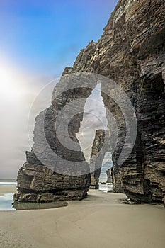 Famous eroded arches of Las Catedrales beach in Ribadeo, Lugo photo