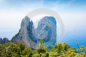 Famous Faraglioni Rocks near Capri Island, Italy. Island of Capri is situated 5 km from mainland in Bay of Naples