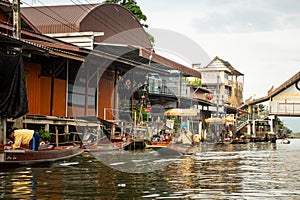 Famous floating market in Thailand, Damnoen Saduak floating market, tourists visiting by boat, Ratchaburi, Thailand