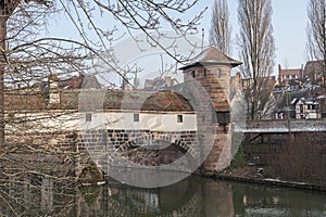 The famous Former Wine Depot Weinstadel and Water Tower Wasserturm over the river Pegnitz and  Henkersteg and Henkerhaus