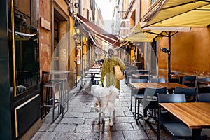 Famous gastronomical street with food stores in Bologna, Italy