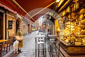 Famous gastronomical street with food stores in Bologna, Italy