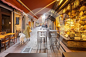 Famous gastronomical street with food stores in Bologna, Italy