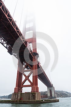 Famous Golden Gate bridge in San Francisco on a foggy day