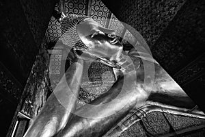 Famous golden reclining buddha statue at wat pho bangkok thailand in black and white