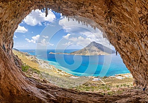 The famous `Grande Grotta`, one of the most popular climbing fields of Kalymnos island, Greece. In the background photo
