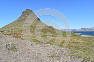 Famous kirkjufell mountain in GrundarfjÃÆÃâÃâÃÂ¶dur in Iceland photo