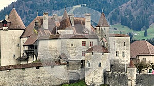 Famous Gruyere Castle in Switzerland also called Schloss Greyerz - aerial view