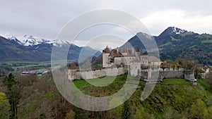 Famous Gruyere Castle in Switzerland also called Schloss Greyerz - aerial view