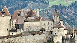 Famous Gruyere Castle in Switzerland also called Schloss Greyerz - aerial view