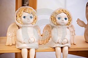 Famous handicraft mart Kaziukas in Vilnius, Lithuania: a pair of blue-eyed angels