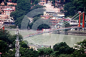 The famous hanging bridge on the River Ganda in Rishikesh, Uttarakhand, India