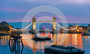 The famous historical bridge over the River Thames at night in London