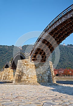 The famous historical wooden arch Kintai Bridge in Iwakuni city in the fall, Japan