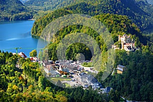 Famous Hohenschwangau Castle on a rugged hill above the village of Hohenschwangau near Fussen in southwest Germany