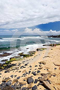 Famous Hookipa beach, popular surfing spot filled with a white sand beach, picnic areas and pavilions. Maui, Hawaii