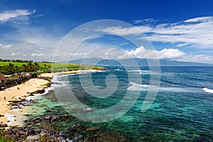 Famous Hookipa beach, popular surfing spot filled with a white sand beach, picnic areas and pavilions. Maui, Hawaii.