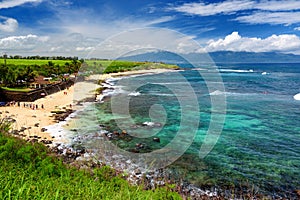 Famous Hookipa beach, popular surfing spot filled with a white sand beach, picnic areas and pavilions. Maui, Hawaii.