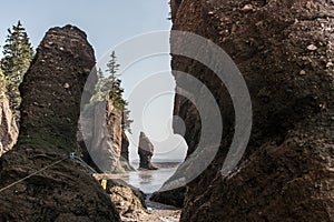 Famous Hopewell Rocks geologigal formations at low tide biggest tidal wave Fundy Bay New Brunswick Canada