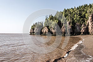 Famous Hopewell Rocks geologigal formations at low tide biggest tidal wave Fundy Bay New Brunswick Canada