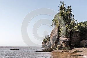 Famous Hopewell Rocks geologigal formations at low tide biggest tidal wave Fundy Bay New Brunswick Canada