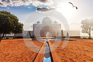 Famous Humayun`s Tomb in the clouds and sunrays, New Dehli, India