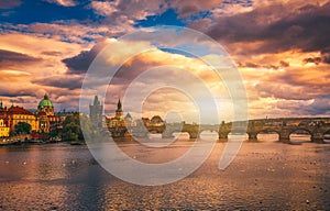 Famous iconic image of Charles bridge at sunset in spring, Prague, Czech Republic. Concept of world travel, sightseeing and