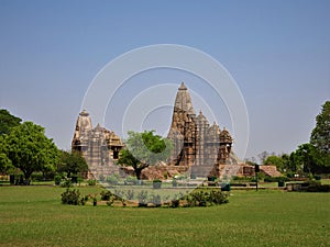 Famous Indian tourist landmark - Kandariya Mahadev Temple, Khajuraho, India. Unesco World Heritage Site