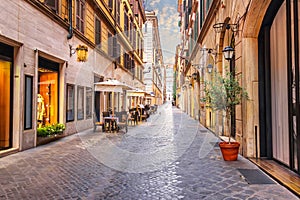 Famous Italian street Via Borgogna with shops and restaurants, Rome, no people photo