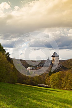 Famous Karlstejn castle in autumn forest,Czech Republic