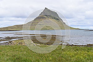 Famous kirkjufell mountain in GrundarfjÃÆÃÂ¶dur in Iceland photo