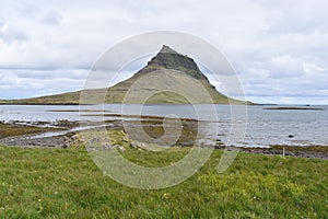 Famous kirkjufell mountain in GrundarfjÃÂ¶dur in Iceland photo