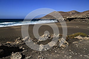 The famous lagoon in Playa la Solapa, Fuerteventura photo